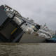 Illustration for article titled These Photos Of That Grounded Car Carrier Ship Are Beautifully Surreal